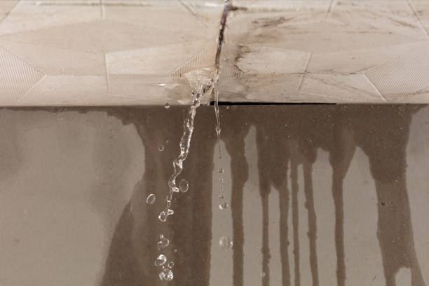 Professional Flood Damage Cleanup technician working in Townsend, MA